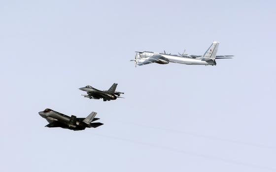 Fighters with North American Aerospace Defense Command, or NORAD, intercept a Russian Tu-96 strategic bomber in the Alaska Air Defense Identification Zone, July 24, 2024. 