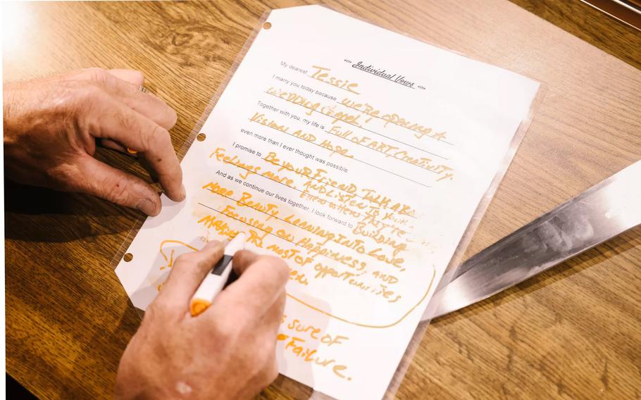 Dan Gambelin fills out a Mad Libs-style form devised so people could quickly write personalized vows. Old Brown House is the brain- and love child of owners Gambelin and Tess Sweet, who renewed their own vows after celebrating the grand opening of the wedding chapel. 