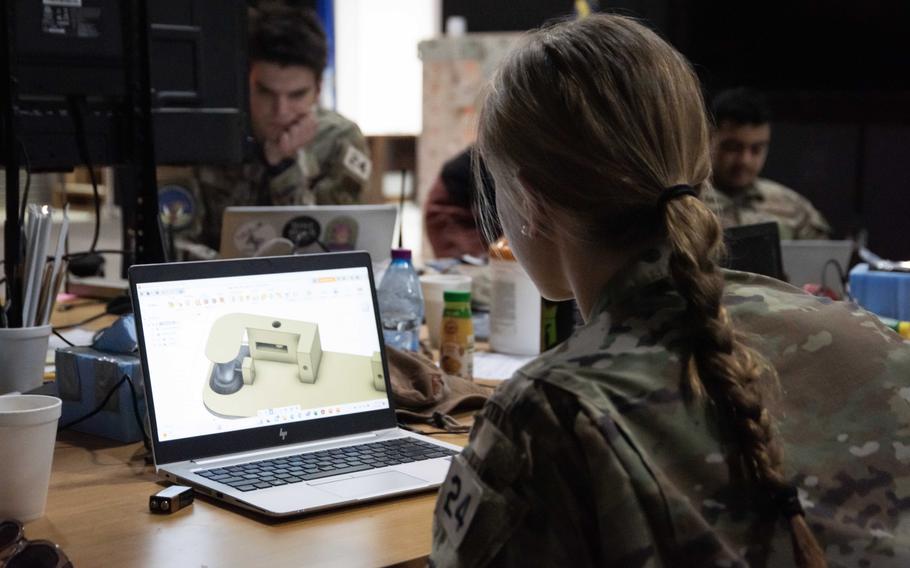 U.S. Air Force Academy cadet Leah Watson creates a 3D model at Task Force 99, Al Udeid Air Base, Qatar, June 22, 2023. Watson worked at the task force as part of the academy’s cadet summer research Program. 