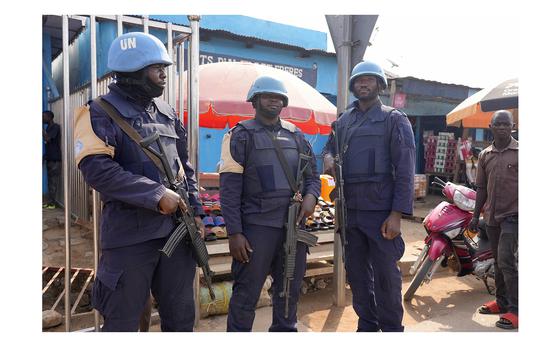 United Nations peacekeepers stand in the market in Bouar, Central ...