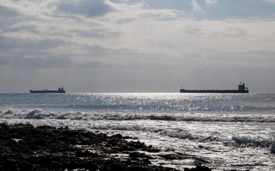 Oil and LNG tanker vessels offshore from the Fort de Bouc in the industrial and port area of Martigues, France, on Jan. 6, 2023. MUST CREDIT: Jeremy Suykur/Bloomberg