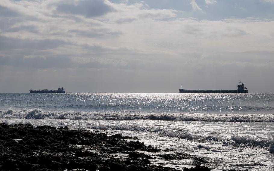 Oil and LNG tanker vessels offshore from the Fort de Bouc in the industrial and port area of Martigues, France, on Jan. 6, 2023. 