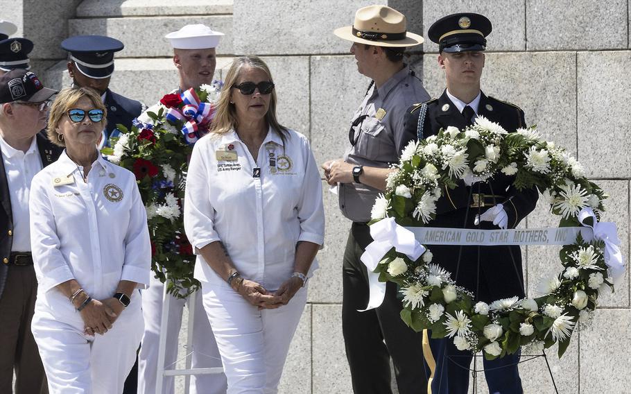 American Gold Star Mothers First Vice President Patti Elliott, left, and National President Pam Stemple place a wreath at the 20th anniversary celebration of the National World War II Memorial in Washington, May 25, 2024.