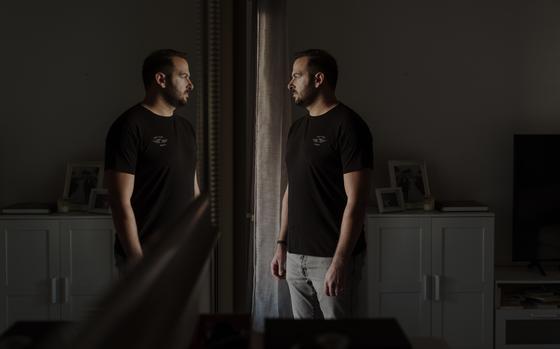 Ari Krauss, a reservist in Israel’s elite Golani Brigade, at home this month in Tel Aviv. MUST CREDIT: Ofir Berman for The Washington Post