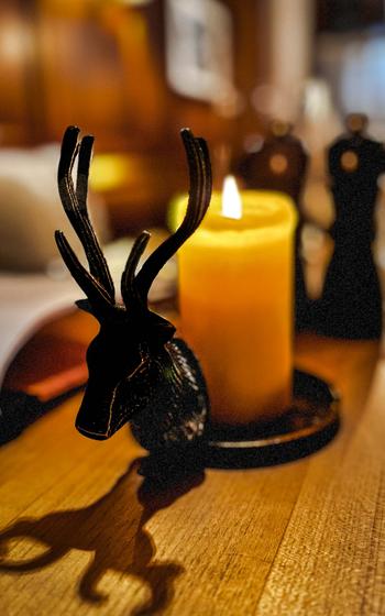 Deer figurines adorn the interior throughout Hirschens Restaurant Wirtsstuben in Parsberg, Germany. The restaurant is in a hotel and serves traditional cuisine made with fresh, locally sourced ingredients.