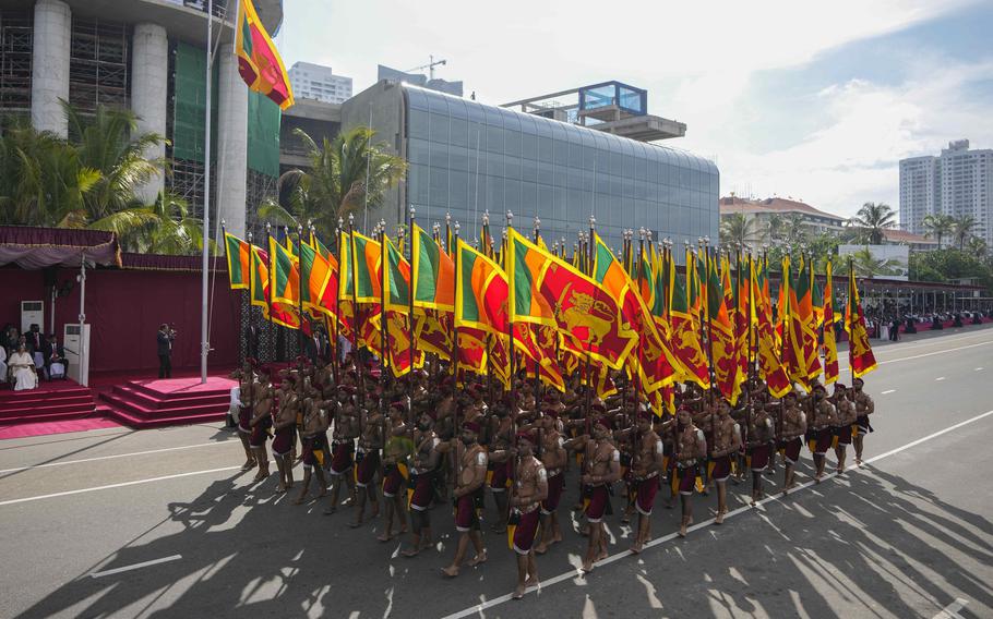 Sri Lankan soldiers march for the 75th Independence Day ceremony in 2023