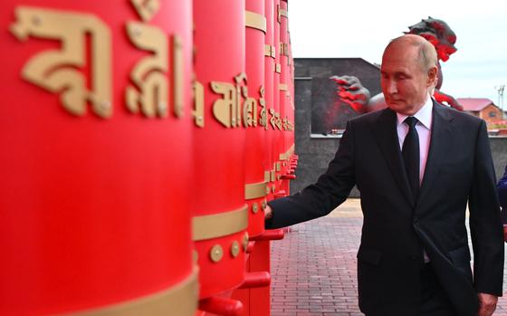 Russian President Vladimir Putin visits Tubten Shedrub Ling datsan in Kyzyl, Republic of Tyva, Russia, Monday, Sept. 2, 2024. (Kristina Kormilitsyna, Sputnik, Kremlin Pool Photo via AP)