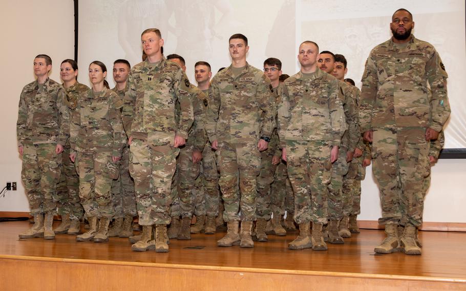 Soldiers are honored in a departure ceremony