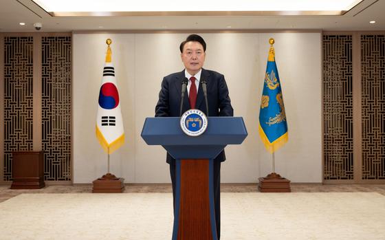 South Korean President Yoon Suk Yeol gives a televised speech at the presidential office in Seoul, South Korea, Dec. 12, 2024.