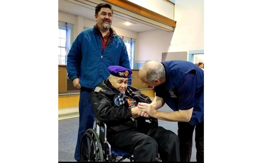 Retired U.S. Navy Chief Warrant Officer 4 Solomon Atkinson, center, is greeted by a representative of the Veterans Advocacy Organization, right, and escorted by son-in-law Franklin Hayward before receiving the Alaska Governor’s Veteran Advocacy Award during a ceremony in 2018. Atkinson returned to his native Alaska after 22 years of naval service in 1976, continuing to serve his community on the Indian Community Council and Board of Education, as a founder and president of the first veteran’s organization on Annette Island, and as mayor of Metlakatla.