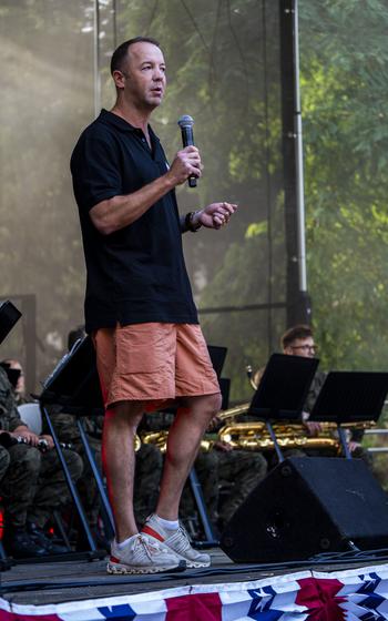 U.S. Army Col. Jesse Chace, the commander of U.S. Army Garrison Poland, welcomes attendees to the inaugural Polish-American Freedom Fest, held at Powidz Lake, Poland, July 4, 2024. 