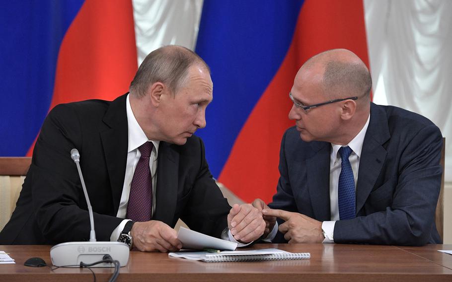 Russian President Vladimir Putin, left, listens to Sergei Kiriyenko, the Kremlin's first deputy chief of staff in charge of domestic politics during a meeting in Kirov, Russia, on Aug. 5, 2017.