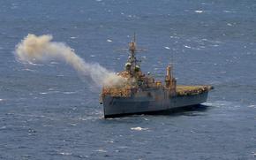 The decommissioned amphibious transport dock USS Dubuque smokes after taking a direct hit with a missile off Hawaii during the Rim of the Pacific exercise on July 11, 2024.