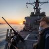 241003-N-AY869-1032 SOUDA BAY, Greece (Oct. 3, 2024) Culinary Specialist 2nd Class Heyang Sun stands small craft action team watch aboard the Arleigh Burke-class guided-missile destroyer USS Cole (DDG 67), Oct. 3. Cole is on a scheduled deployment in the U.S. Naval Forces Europe area of operations, employed by U.S. 6th Fleet to defend U.S., allied and partner interests. (U.S. Navy photo by Mass Communication Specialist Seaman Mark Peña