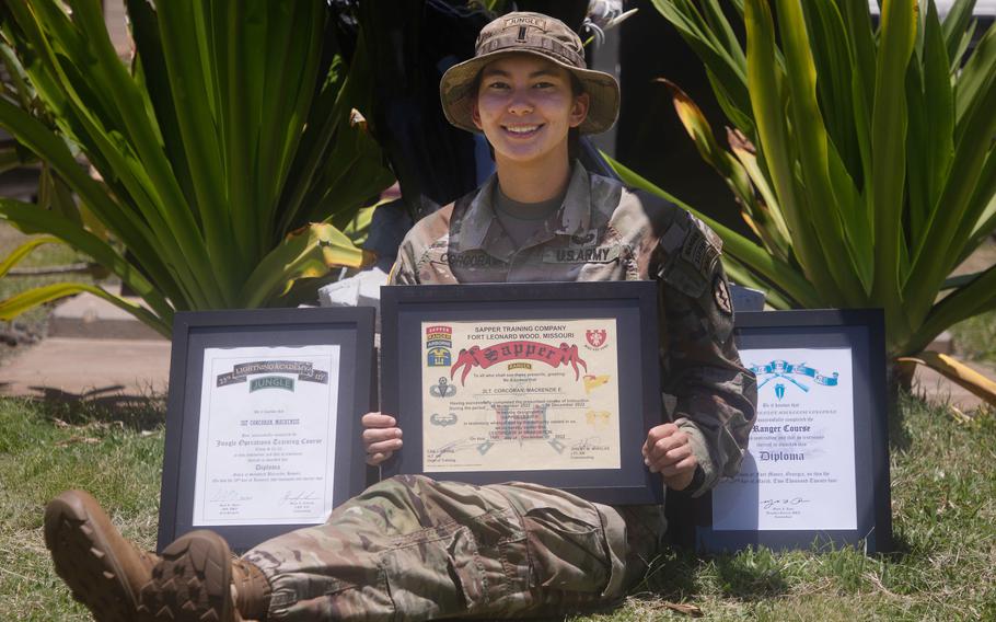 1st Lt. Mackenzie Corcoran, assigned to the 29th Brigade Engineer Battalion, 25th Infantry Division, poses with her Jungle, Sapper and Ranger certificates at Schofield Barracks, Hawaii, June 6, 2024. 