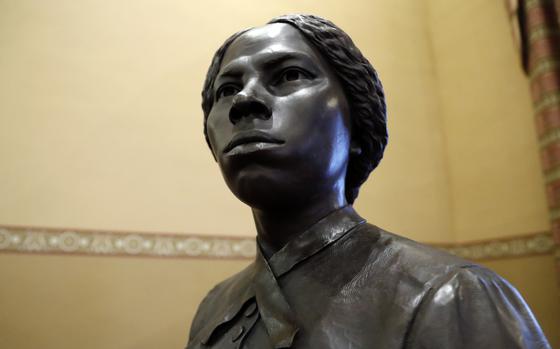 A bronze statue of abolitionist Harriet Tubman.