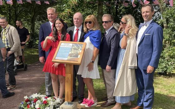 The family of Peter Bylen attends a tribute July 28, 2024, in the village of Saint-Germain-Sur-Seves, France. Bylen was killed there in battle during World War II.