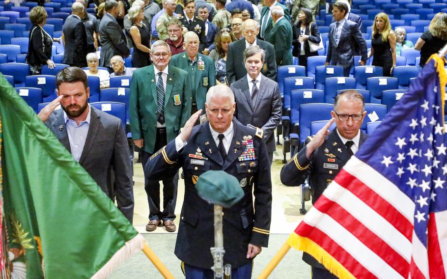 From left: Sgt. Maj. Matt Parrish, Chaplain, Col. Eric Albertson, and Chaplain, Lt. Col. Vince Garcia salute a memorial to retired Sgt. Maj. William “Billy” Waugh while attending USSOCOM’s memorial ceremony for Waugh on June 27, 2023, at MacDill Air Force Base in Tampa.