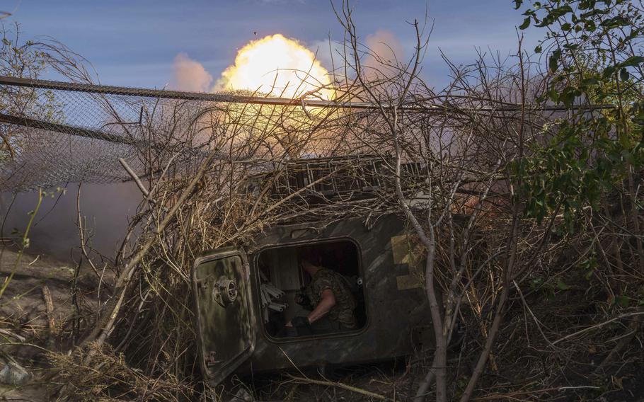 Ukrainian serviceman of 56th brigade fire by self-propelled artillery towards Russian positions