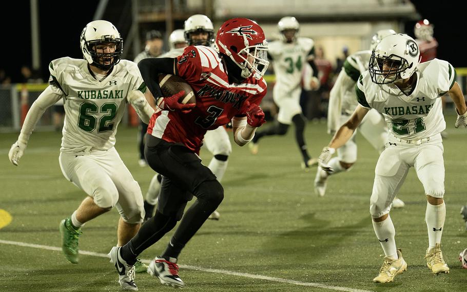 Jesse Brooks runs with the ball.