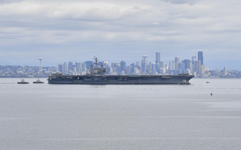 Nimitz-class aircraft carrier USS Ronald Reagan steams through the Puget Sound toward its new homeport Naval Base Kitsap in Bremerton, Wash., on Aug. 13, 2024. 