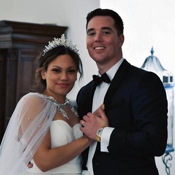 U.S. Air Force Master Sgt. Darren Thedieck and his wife, Naudia, pose for a photo during their wedding in Denmark on April 29, 2023. Now 31, Thedieck started investing when he joined the Air Force at 18. His goal is to retire at 38 and be financially independent.