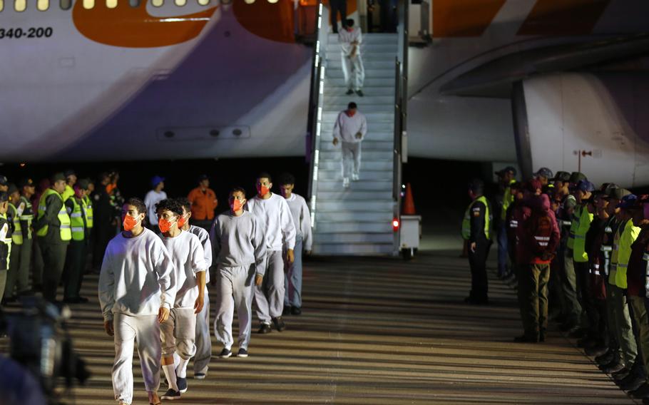 Venezuelan migrants deported from the United States deplane at the Simon Bolivar International Airport in Maiquetia, Venezuela, Feb. 20, 2025.