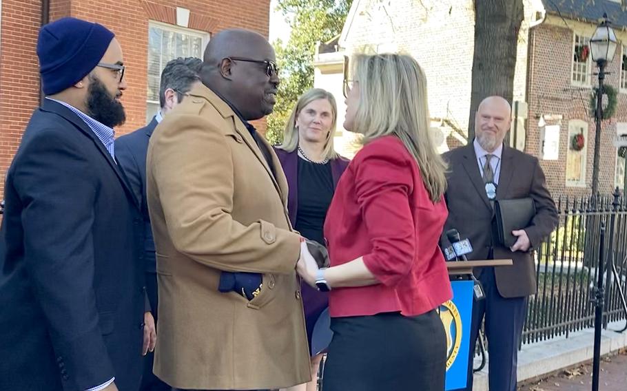 Outside the circuit courthouse, Leonard Cummings Jr., the husband of Michelle Cummings, embraces Assistant State's Attorney Carolynn Grammas, who prosecuted Angelo Harrod, the 31-year-old Annapolis resident found guilty of murder for participating in the shooting that killed his wife last year.