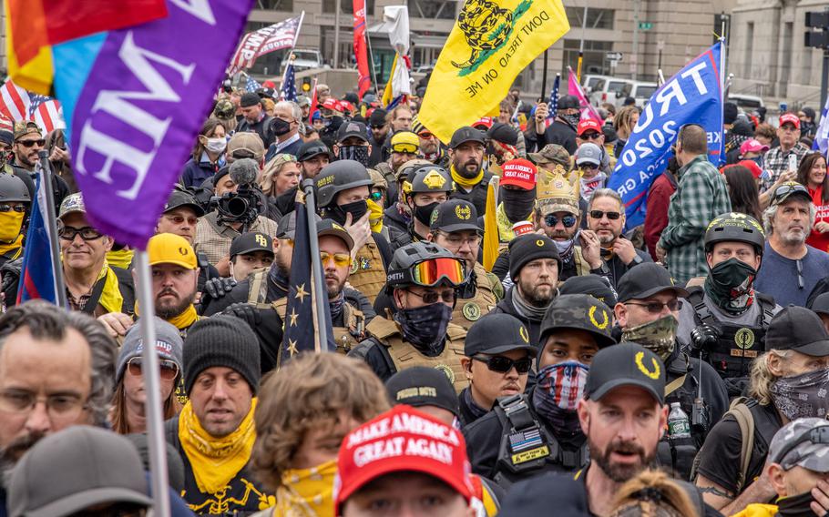 Members of the Proud Boys attend a pro-Trump rally in Washington on Dec. 12, 2020. 
