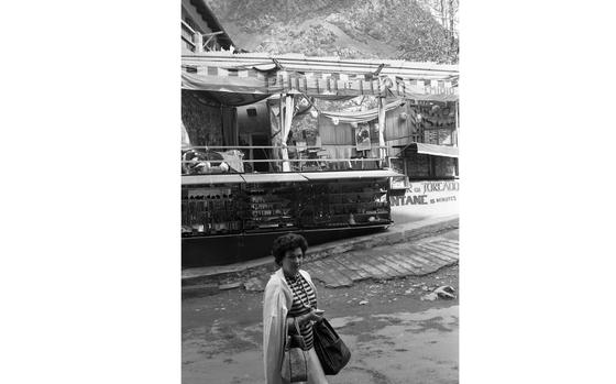 Andorra la Vella, Sep. 27, 1962: An Andorran woman throws the photographer a questioning look on a street in Andorra la Vella, Andorra. Behind her are a couple of the local knick-knack stands that cater predominantly to tourist. Nestled in the Pyrenees mountains and close to the Spanish border, the city is the capital of the small Principality of Andorra. The tax-free principality is a shopping haven for many tourists flocking from neighboring Spain and France.

Looking for a getaway where you're stationed? Check out Stars and Stripes' community pages for travel tips in Europe and the Pacific!
https://www.stripes.com/communities/

META TAGS: Europe; Andorra; city; street; tourism; culture; locals; Andorrans; tourists