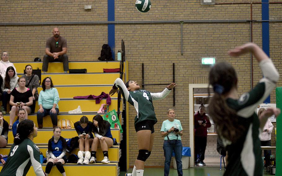 AFNORTH's Selah Skariah leaps to attack the ball during the Lions' match with Ansbach on Oct. 7, 2023, at AFNORTH International School in Brunssum, Netherlands.