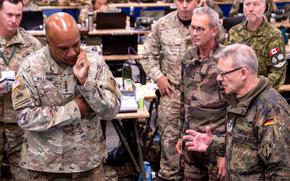 German Col. Michael Von Block, front right, briefs Gen. Darryl A. Williams, U.S. Army Europe and Africa commander, during Exercise Avenger Triad 24 in the United Kingdom on Sept. 15, 2024.