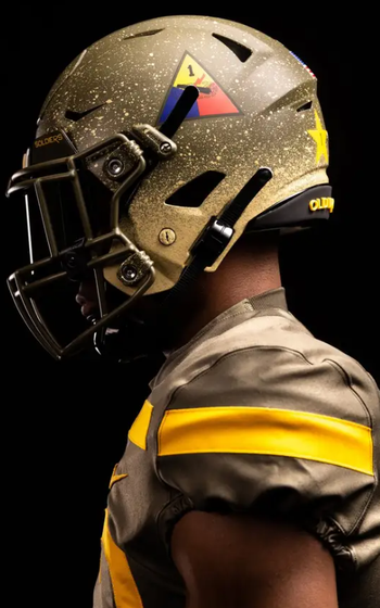 An Army player in profile wearing his helmet.