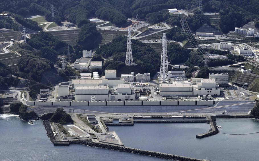 A nuclear power plant building along a coast.