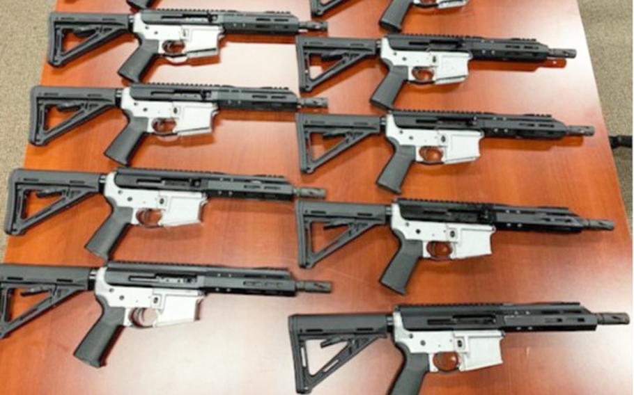 A collection of ghost guns sold by an active-duty Marine