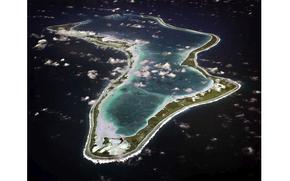 FILE - This image realeased by the U.S. Navy shows an aerial view of Diego Garcia. (U.S. Navy via AP, File)