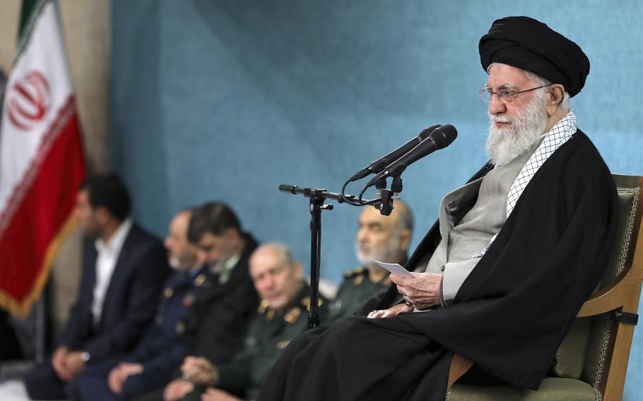  Supreme Leader Ayatollah Ali Khamenei speaks to an audience with other government officials.