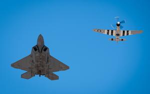 The view from below, a modern F-22 and a WWII P-51 Mustang.