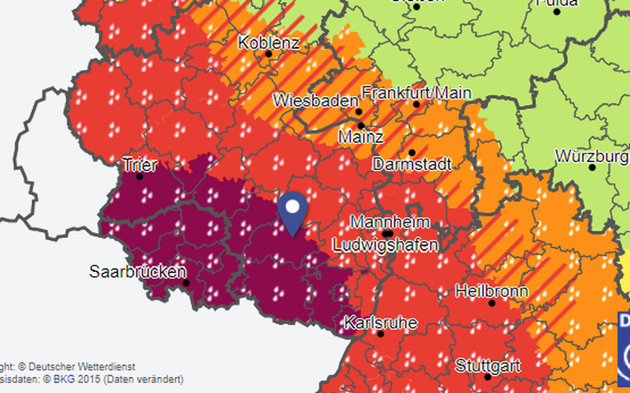 A weather map from the German Weather Service displays the areas under a severe storm warning for extreme heavy rain.