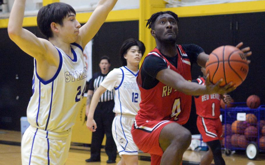 Kennedy Hamilton helped lead Nile C. Kinnick to a Far East Division I boys basketball title. He was also a tennis player and track athlete for the Red Devils.