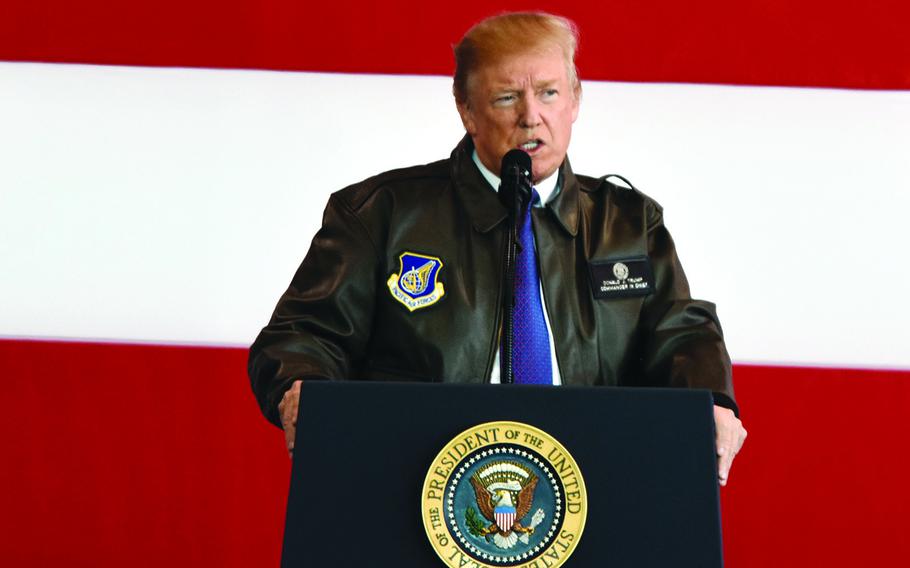 President Donald Trump speaks to service members at Yokota Air Base.