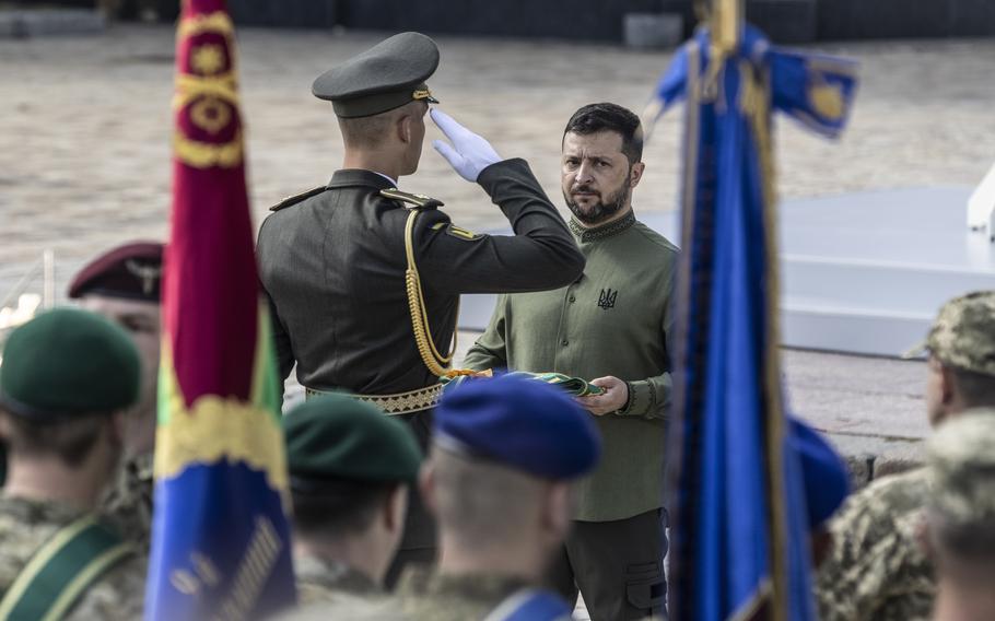 President Volodymyr Zelenskyy awards medals to Ukrainian soldiers — and their survivors — in an Independence Day ceremony outside St. Sophia’s Cathedral in Kyiv.