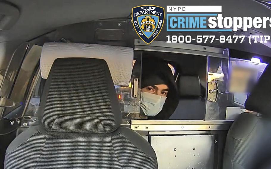 Shows a suspect in the fatal shooting of UnitedHealthcare CEO Brian Thompson on Dec. 4, 2024, in a taxi. 