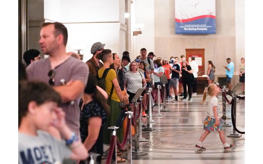 People line up to view the Emancipation Proclamation at the National Archives in Washington on June 17, 2023. 