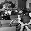 Tokyo, Japan, July 24, 1964: Young guests and visitors drink at chat in the cocktail lounge of the Sanno Hotel in Tokyo, Japan. The Sanno Hotel was once the most famous and prominent building on Sotobori-dori, a wide, busy boulevard that winds through the scenic heart of Tokyo. Serving as a transient billeting facility for field grade officers and their families in 1964, the American military was not always welcome at the Sanno. The building - built in 1932 - was once the spawning nest for " ni-ni-roku" (2-2-6), the February 26, 1936 military revolt that shook Japan but failed to overthrow the government. The New Sanno Hotel opened in 1983, replacing the old facility which was demolished.  

META TAGS: hospitality industry; Sanno Hotel; military life;  Military history; 