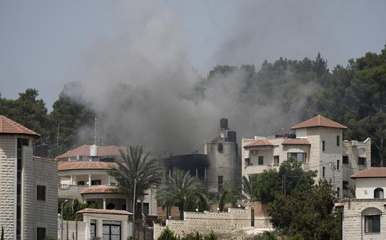 Smoke rises during an Israeli military operation in the West Bank city of Jenin, Friday, July 5, 2024. The Israeli military said Friday it was conducting counterterrorism activity that included an airstrike in the area of the West Bank city of Jenin. Palestinian authorities said five people were killed. 