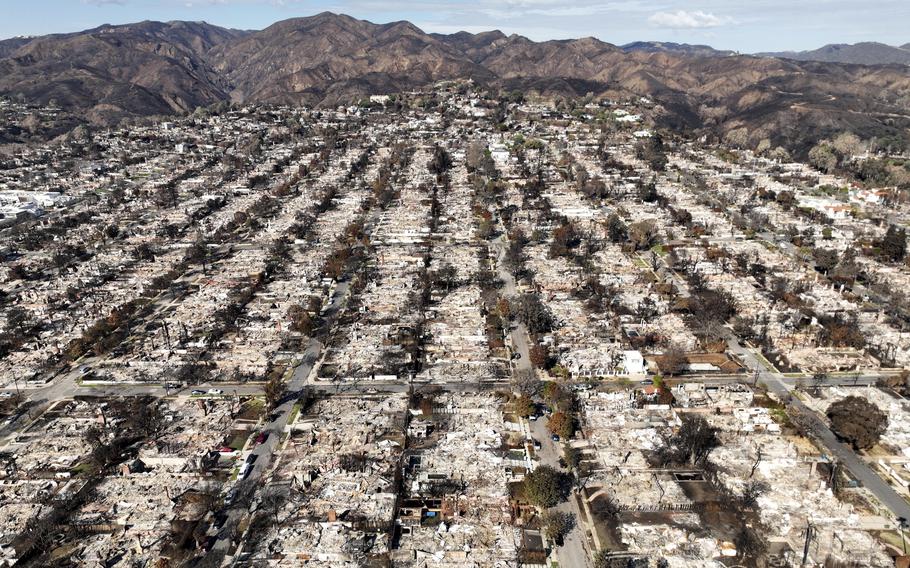 The devastation from the Palisades Fire is shown in an aerial view