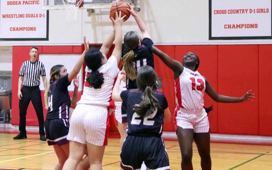 Bella Hunter gets a rebound.