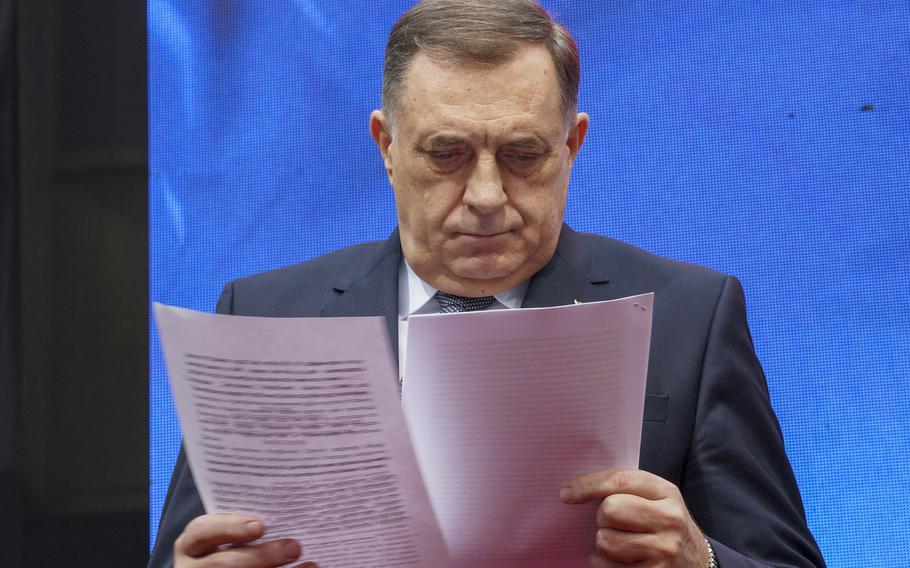 Bosnian Serb President Milorad Dodik watches ruling by the court after a court sentenced him to one year in prison and banned him from engaging in politics for six years over his separatist actions, during a rally in the Bosnian town of Banja Luka, 240 kms northwest of Sarajevo, Wednesday, Feb. 26, 2025. 