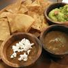 Appetizers at Kuma Cantina in Tokyo include chips with guacamole, salsa and bean dip.